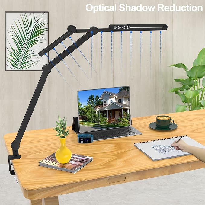 Monitor light bar illuminating desktop to reduce eye strain